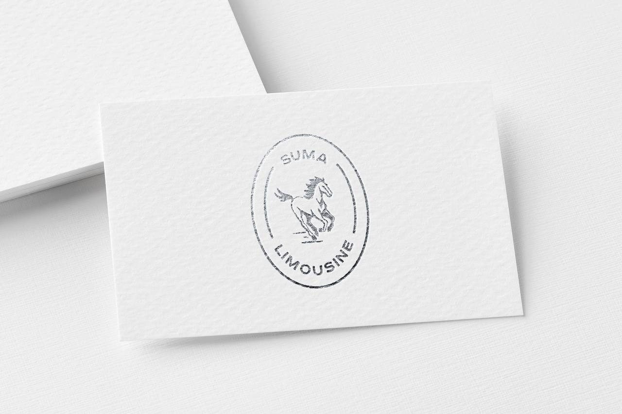 SUMA LIMOUSINE business card with silver foil emblem